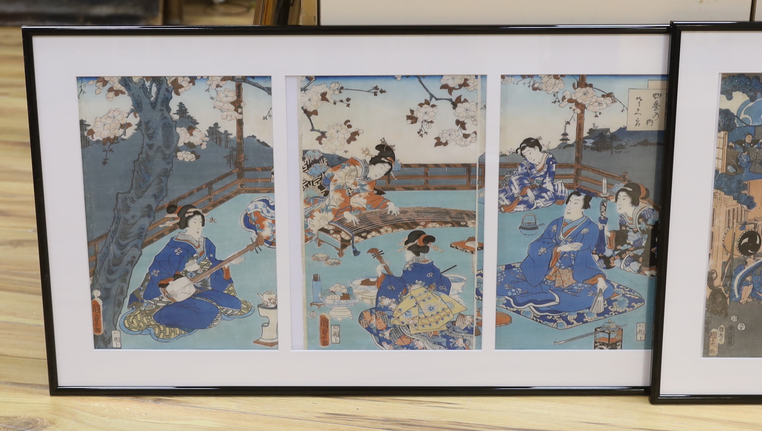 A set of three Japanese triptych woodblock prints, including after Kuniyochi (1798-1861), scene of Kabul, and after Kuni Sada (1786-1865), Shi Kino Uchi Sakura, largest overall 75cm x 35cm